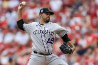 Colorado Rockies' Antonio Senzatela throws during the first inning of a baseball game against the Cincinnati Reds in Cincinnati, Sunday, June 13, 2021. (AP Photo/Aaron Doster)