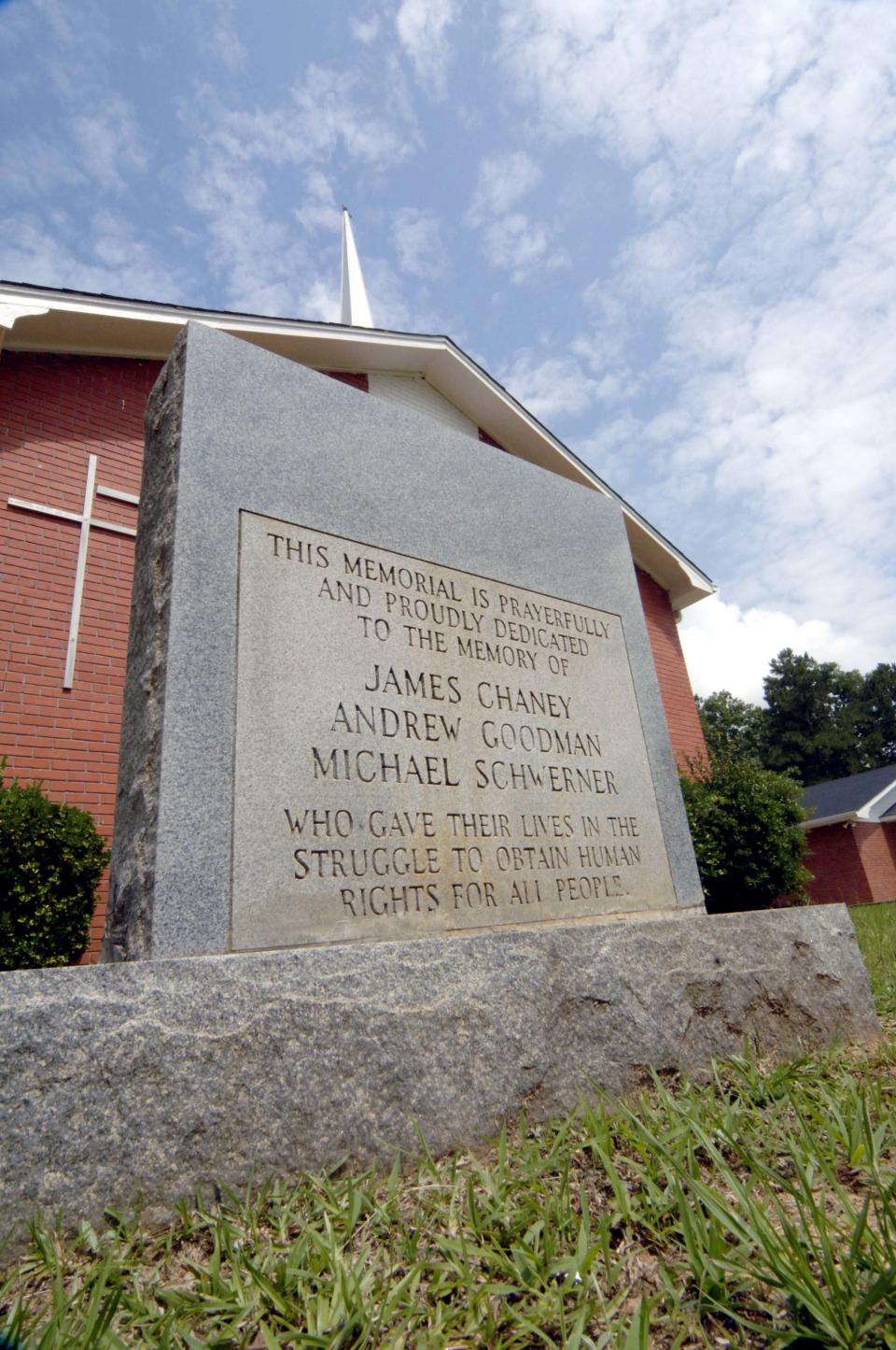 <p>A stone outside the Mt. Zion United Methodist Church memorializes three men, James Chaney, Michael Schwerner and Andrew Goodman June 10, 2005 in Philadelphia, Mississippi. The men were sent to investigate a fire at the church and beatings of church members by Klansmen. The men later disappeared and their bodies were discovered Aug. 4, 1964, in an earthen dam outside of Philadelphia. The case, which came to be known as Mississippi Burning, was said to have paved the way for the U.S. civil rights movement. (Photo: Marianne Todd/Getty Images) </p>