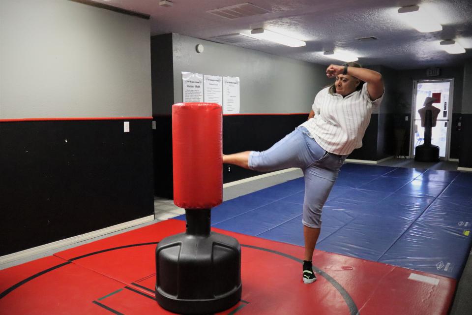 Angela Sheetz, 64, is a regular student in the senior karate class. She shows off her high kicks during the Saturday, May 11 class, demonstrating that seniors can be just as agile as other students.