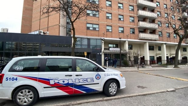 Ontario's Special Investigations Unit is on scene after Toronto police officers shot a man at this downtown apartment building on Tuesday morning. (Paul Smith/CBC - image credit)