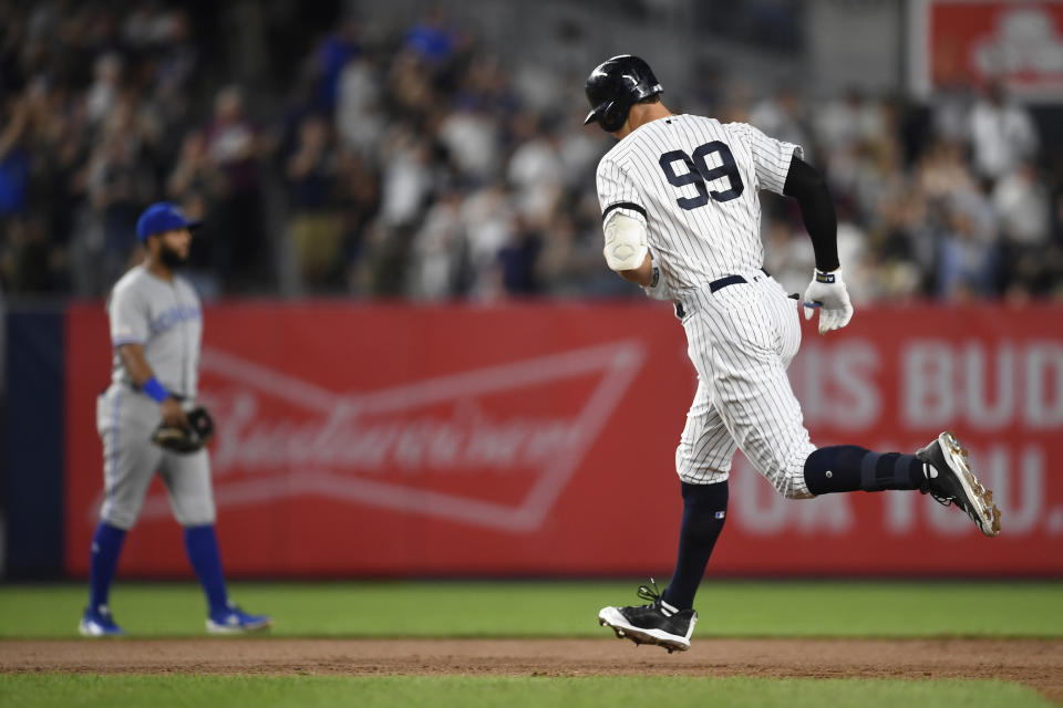 New York Yankees' Aaron Judge rounds second base after hitting a home run during the fourth inning of the team's baseball game against the Toronto Blue Jays, Friday, Sept. 20, 2019, in New York. (AP Photo/Sarah Stier)