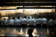 Ultra-Orthodox Jews prepare special matzoh, a traditional handmade Passover unleavened bread, at a bakery in Bnei Brak near Tel Aviv, Israel. Thursday, April 10, 2014. Jews are forbidden to eat leavened foodstuffs during the Passover holiday. Passover celebrates the biblical story of the Israelites' escape from slavery and exodus from Egypt. (AP Photo/Oded Balilty)