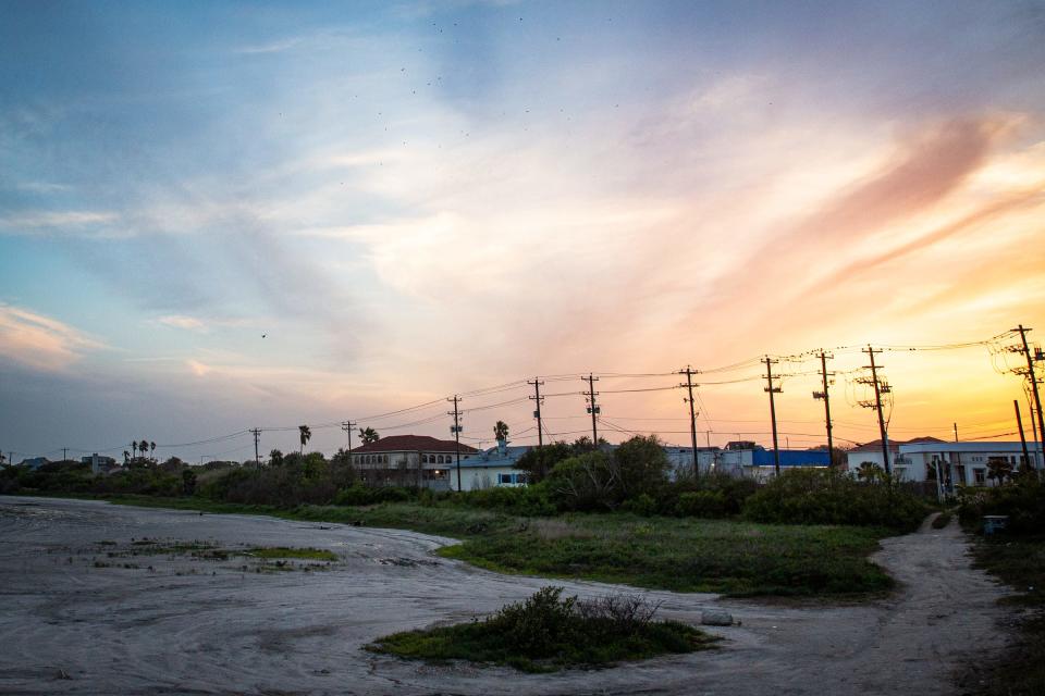 Businesses and homes line Cayo del Oso, the northwest shore of Oso Bay, where hundreds of Indigenous remains have been excavated over the past 150 years, on April 19, 2023, in Corpus Christi, Texas.