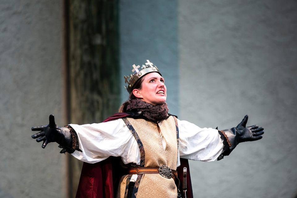 Katy Hahn perform during a dress rehearsal for Riverside Theatre's production of "Henry V," on Wednesday at the Riverside Festival Stage in Lower City Park in Iowa City. Hahn plays the title role in the free production that opens its three-weekend run Friday.