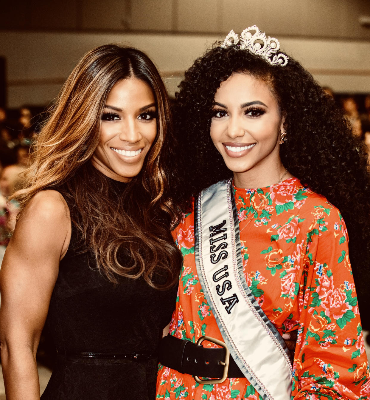 April Simpkins, left, and her daughter, Cheslie Kryst, wearing the 2019 Miss USA sash and tiara.