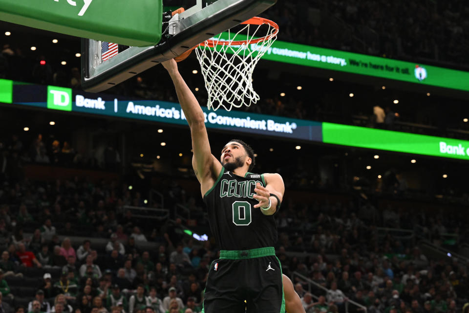 BOSTON, MASSACHUSETTS - MARCH 24: Jayson Tatum #0 of the Boston Celtics attempts a layup against the Indiana Pacers during the third quarter at the TD Garden on March 24, 2023 in Boston, Massachusetts. NOTE TO USER: User expressly acknowledges and agrees that, by downloading and or using this photograph, User is consenting to the terms and conditions of the Getty Images License Agreement. (Photo by Brian Fluharty/Getty Images)