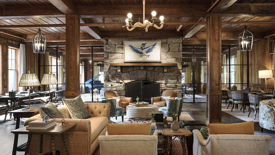 The original 1930s lobby lounge, with its four-sided fireplace, was renovated by the Blackberry Farm design unit. - Credit: Ball & Albanese