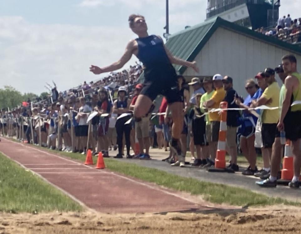 Seneca's Lee Hoover competes in the Class 2A triple jump in the District 10 track and field championships at Slippery Rock University on Saturday, May 21, 2022. Hoover won the event.