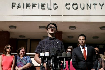 Matthew Soto, whose sister Victoria was killed at the Sandy Hook Elementary School shooting, speaks to the media outside the Fairfield County Courthouse in Bridgeport, Connecticut, U.S., June 20, 2016, where the maker of the gun used in the 2012 massacre of 26 young children and educators at the Connecticut elementary school will ask a judge to toss a lawsuit saying the weapon never should have been sold to a civilian. REUTERS/Mike Segar