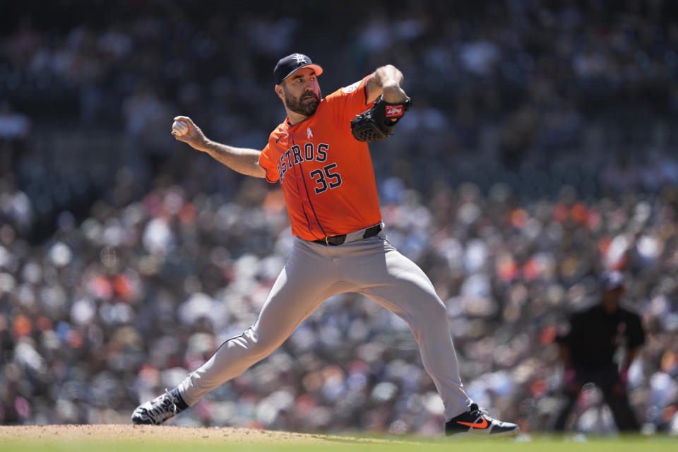 Houston Astros pitcher Justin Verlander throws against the Detroit Tigers in the third inning of a baseball game, Sunday, May 12, 2024, in Detroit. (AP Photo/Paul Sancya)