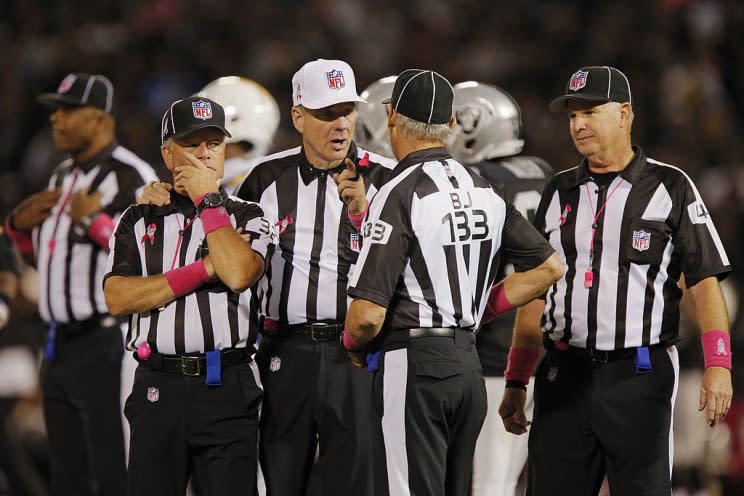 The days of refs discussing penalties forever could be coming to an end. (Getty)