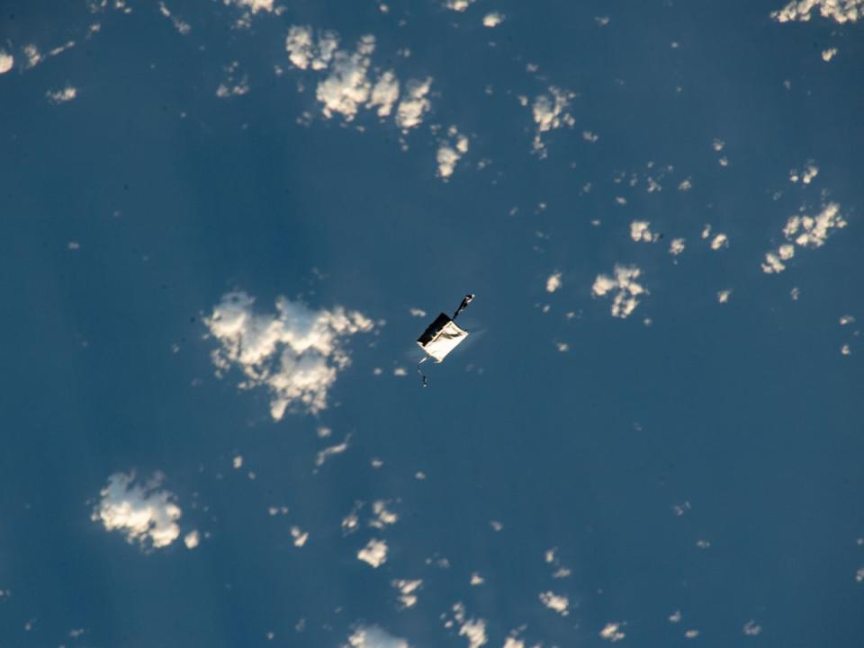 A Japanese astronaut inadvertently snapped the wandering tool bag while taking orbital photos of Mt Fuji (Satoshi Furukawa / Earth Science and Remote Sensing Unit, NASA Johnson Space Center (image ISS070-E-15786))