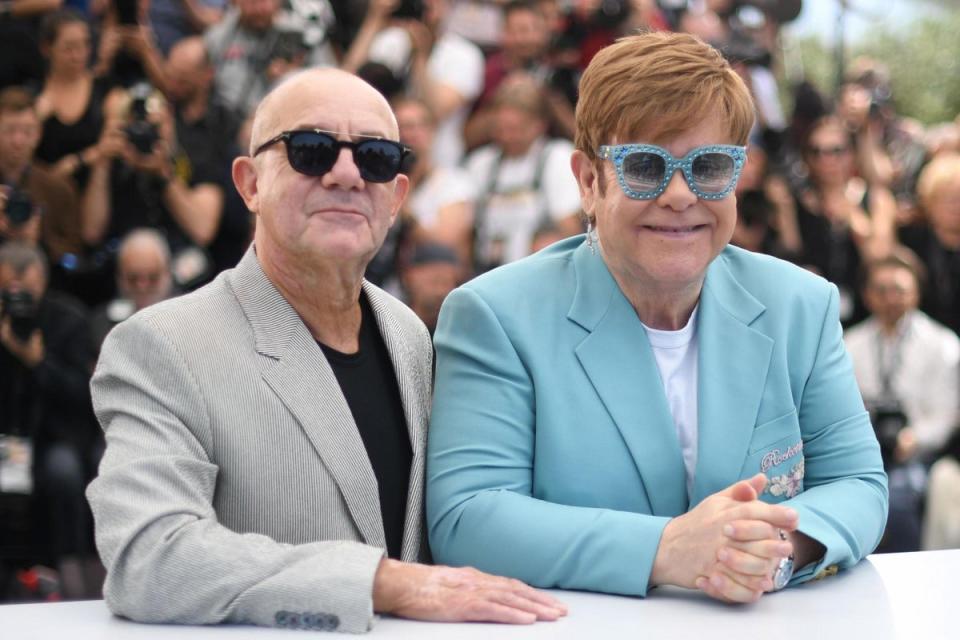Taupin pictured with Elton in 2019 (AFP via Getty Images)