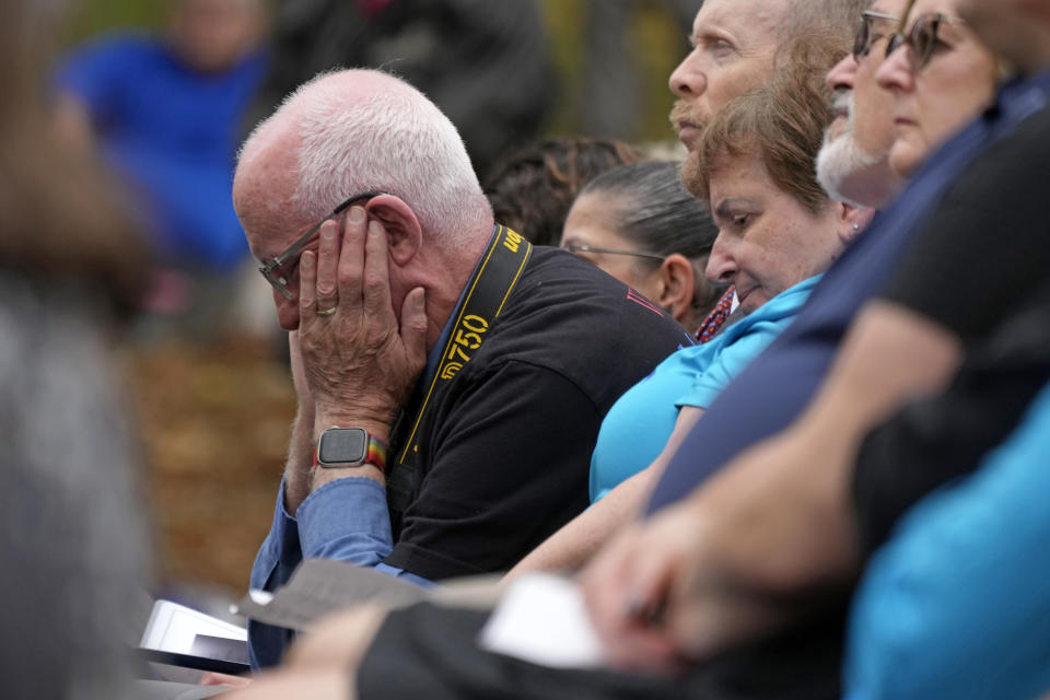 Don Salvin, left, attends a Commemoration Ceremony, on Friday, Oct. 27, 2023, in Schenley Park, in the Squirrel Hill neighborhood of Pittsburgh, to remember the 11 worshippers killed by a gunman at the Tree of Life synagogue five years ago. (AP Photo/Gene J. Puskar)