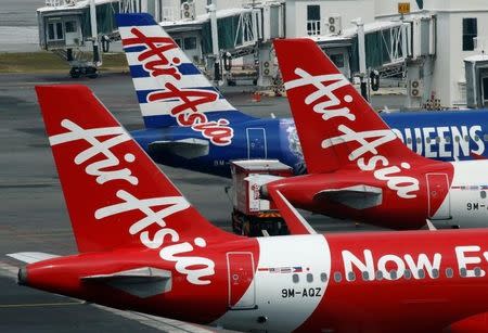 AirAsia planes sit on the tarmac at Kuala Lumpur International Airport, Malaysia August 28, 2016. REUTERS/Edgar Su RTX2NBE0