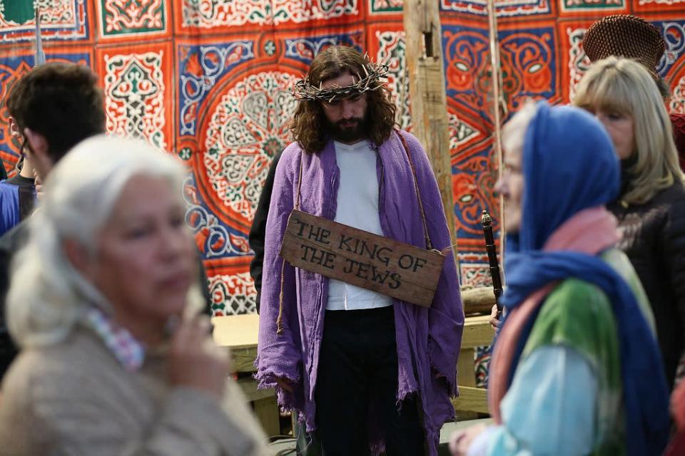 Actor James Burke-Dunsmore (C) plays Jesus in a rehearsal of 'The Passion of Jesus' by the Wintershall Players on the Wintershall estate on March 16, 2013 in Bramley, England. The Wintershall Players are based on the estate and perform several biblical theatrical productions per year. Their performance of 'The Passion of Jesus' will be performed live in Trafalgar Square, London on Good Friday, March 29, 2013. The production includes a cast of 78 actors, horses, a donkey and authentic costumes of Roman soldiers in the 12th Legion of the Roman Army.