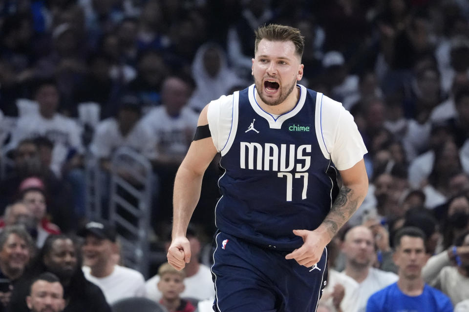 Dallas Mavericks guard Luka Doncic yells after scoring during the first half in Game 5 of an NBA basketball first-round playoff series against the Los Angeles Clippers Wednesday, May 1, 2024, in Los Angeles. (AP Photo/Mark J. Terrill)