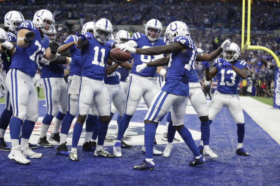 Indianapolis Colts wide receiver Zach Pascal (14) celebrates after making a touchdown reception during the first half of an NFL football game against the Atlanta Falcons, Sunday, Sept. 22, 2019, in Indianapolis. (AP Photo/Michael Conroy)