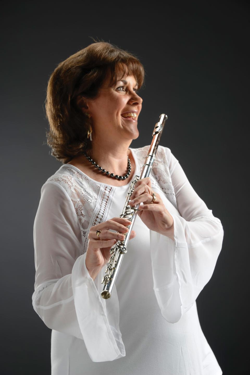 Betsy Traba is principal flute for the Sarasota Orchestra.