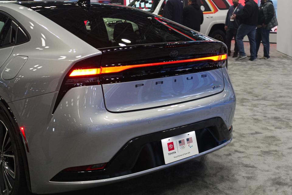 A silver Toyota Prius, viewed from the rear in close up.