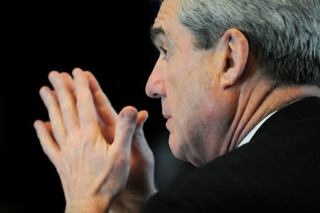 FILE PHOTO: Robert Mueller, serving as U.S. FBI director, attends a meeting of Cabinet-level officials to discuss efforts against human trafficking at the State Department in Washington, February 1, 2011. REUTERS/Jonathan Ernst/File Photo