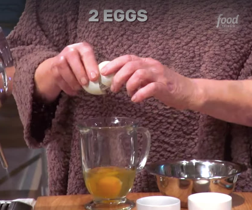 She prepares the eggs in a heatproof jug with salt, pepper and butter. Photo: Facebook/Food Network