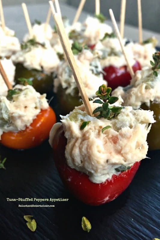 <p>Reluctant Entertainer</p><p>These perfect, pepper bites are filled with tuna, greek yogurt and seasonings. </p><p><strong>Get the recipe: <a href="https://reluctantentertainer.com/tuna-stuffed-peppers/" rel="nofollow noopener" target="_blank" data-ylk="slk:Tuna Stuffed Peppers;elm:context_link;itc:0;sec:content-canvas" class="link ">Tuna Stuffed Peppers</a></strong></p>