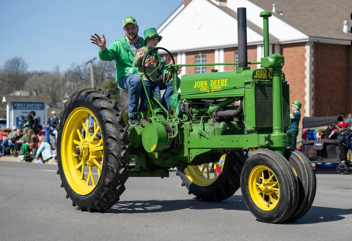 A vintage John Deere tractor rolled along Johnson Drive during the 38th annual Shawnee St. Patrick’s Day Parade on Sunday, March 10, 2024, in downtown Shawnee.