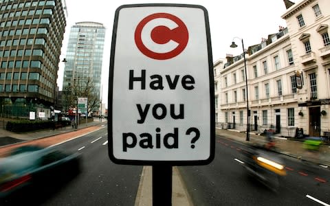 A Congestion Charge sign - Credit: Reuters