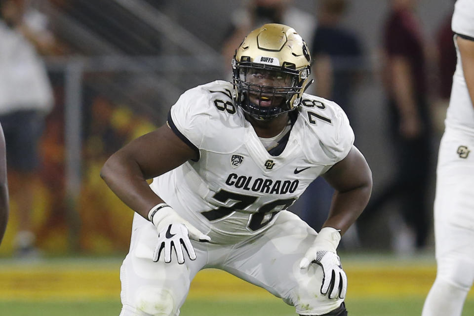 FILE- In this Sept. 21, 2019, file photo, Colorado offensive lineman William Sherman (78) gets set at the line during the first half of an NCAA college football game against Arizona State in Tempe, Ariz. The scouts were there in big numbers. But NFL prospects who were timed and tested, poked and prodded at the pro days didn’t have the usual contingent of underclassmen looking on and offering their support. (AP Photo/Rick Scuteri, File)