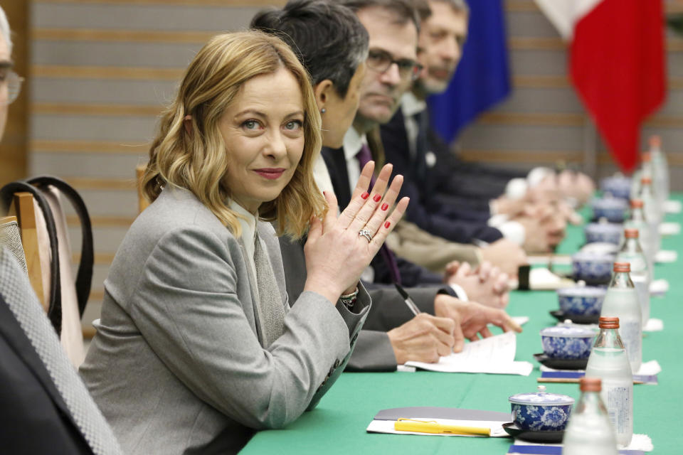 Italian Premier Giorgia Meloni attends a meeting with Japanese Prime Minister Fumio Kishida at the prime minister's office in Tokyo on Monday, Feb. 5, 2024. (Rodrigo Reyes Marin/Pool Photo via AP)