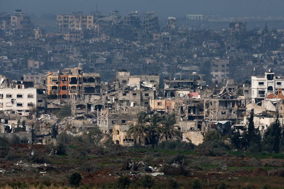 Damaged houses lie in ruin in Gaza, amid the ongoing conflict between Israel and the Hamas, as seen from Israel Wednesday. 