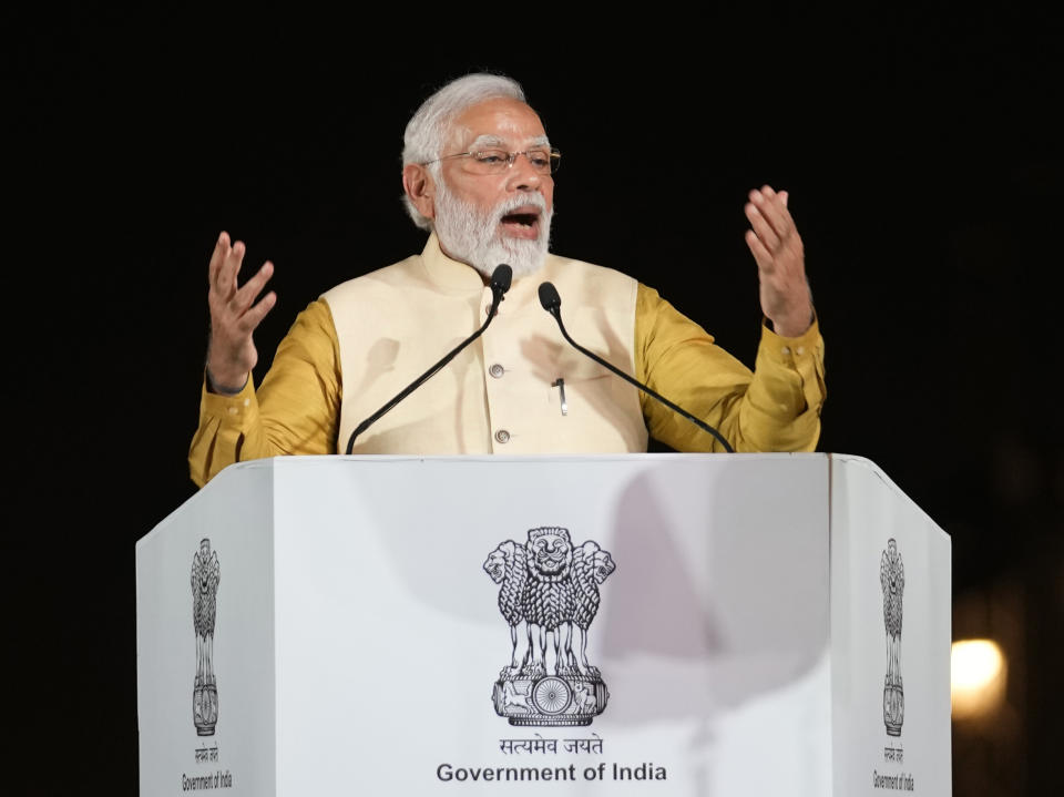 Indian Prime Minister Narendra Modi speaks at the inauguration of the revamped Central Vista Avenue at the India Gate in New Delhi, India, Thursday, Sept. 8, 2022. Modi urged the country to shed its colonial ties in a ceremony to rename Rajpath, a boulevard that was once called Kingsway after King George V, Modi called it a "symbol of slavery" under the British Raj. (AP Photo/Manish Swarup)