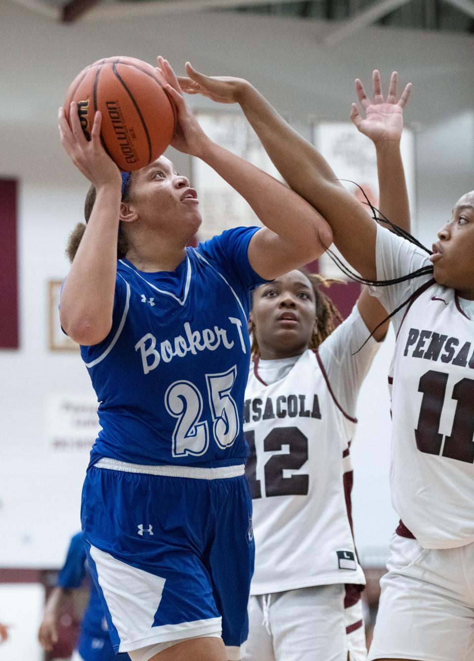 Chamiah Francis (25) looks to shoot during the Booker T. Washington vs Pensacola girls basketball game at Pensacola High School on Friday, Jan. 20, 2023.