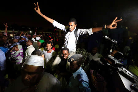 Supporters carry a released politician outside the National Prison, after demonstrations in Khartoum, Sudan February 18, 2018. REUTERS/Mohamed Nureldin Abdallah