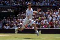 Great Britain's Andy Murray in action against Serbia's Novak Djokovic on day thirteen of the Wimbledon Championships at The All England Lawn Tennis and Croquet Club, Wimbledon.