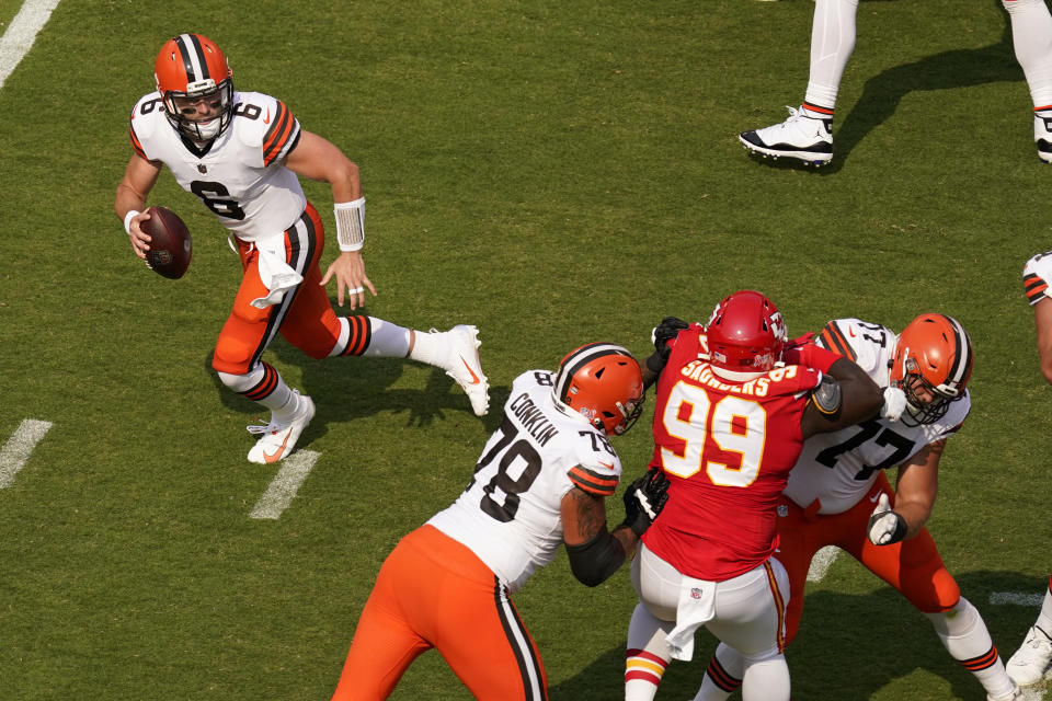 Cleveland Browns quarterback Baker Mayfield (6) scrambles during the first half of an NFL football game against the Kansas City Chiefs Sunday, Sept. 12, 2021, in Kansas City, Mo. (AP Photo/Charlie Riedel)