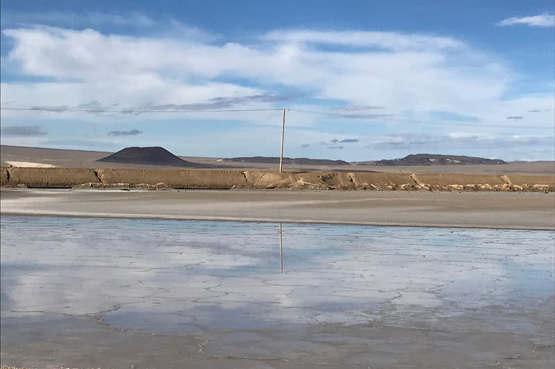 FILE PHOTO: One of Albemarle's lithium evaporation ponds reflects the sky at its facility in Silver Peak