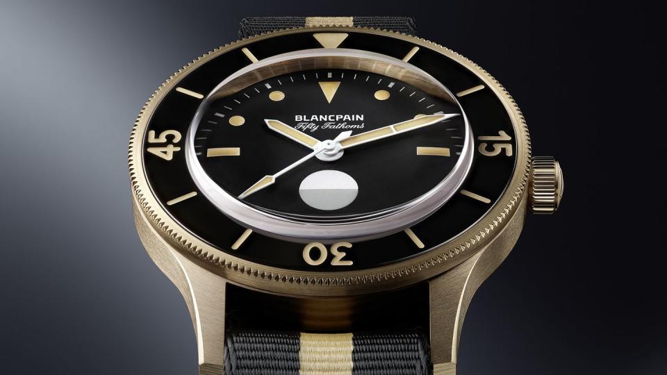 a black and gold watch