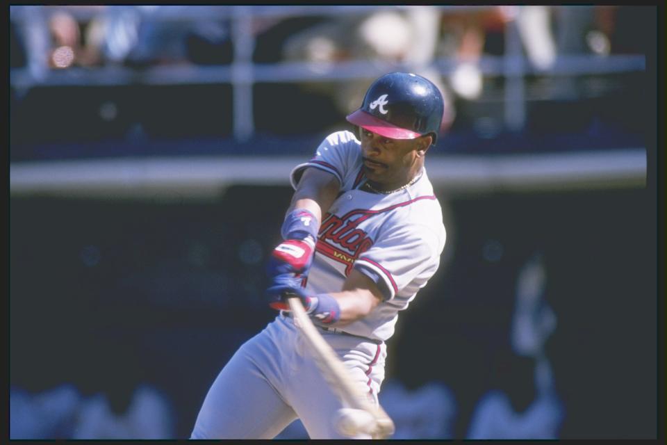 11 Apr 1996:  Outfielder Dwight Smith of the Atlanta Braves swings at the ball during a game against the San Diego Padres at Jack Murphy Stadium in San Diego, California.  The Padres won the game 2-1. Mandatory Credit: Stephen Dunn  /Allsport