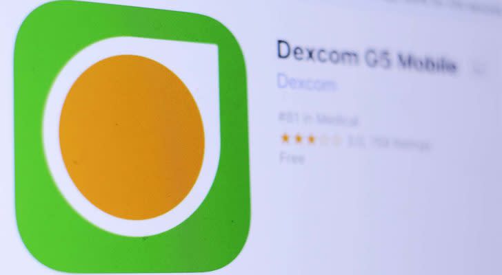 Dexcom (DXCM) logo on an app store page on a mobile phone. IoT Stocks