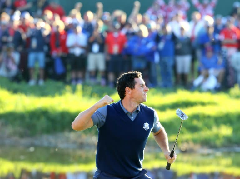 Rory McIlroy of Team Europe reacts on the 16th green after making a putt to win the match during afternoon four-ball matches of the 2016 Ryder Cup, at Hazeltine National Golf Club in Chaska, Minnesota, on September 30