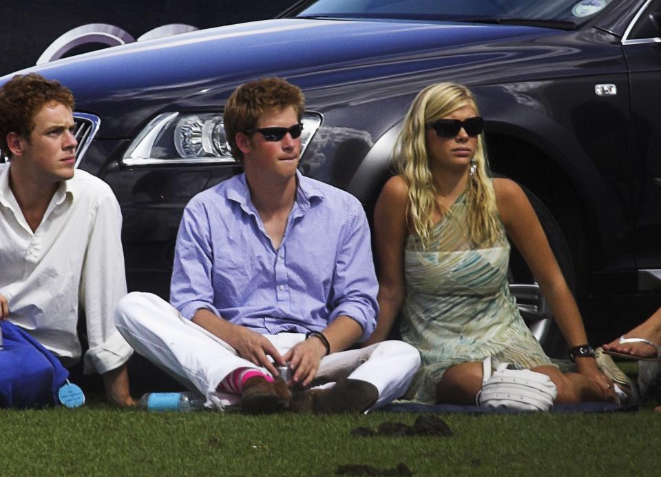 EGHAM, UNITED KINGDOM - JULY 30:  Prince Harry and his girlfriend Chelsy Davy attend the Cartier International Polo match at the Guards Polo Club on July 30, 2006 in Egham, England.  (Photo by MJ Kim/Getty Images)