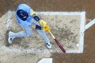 Tampa Bay Rays' Isaac Paredes hits a single during the sixth inning of a baseball game against the Milwaukee Brewers Monday, April 29, 2024, in Milwaukee. (AP Photo/Morry Gash)