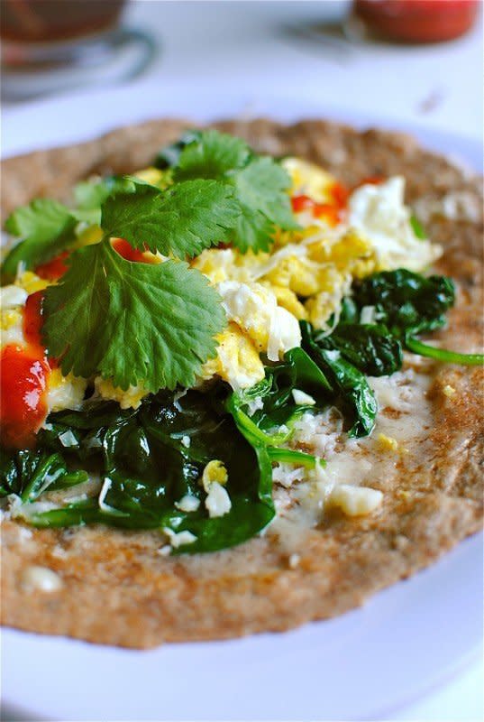 <strong>Get the <a href="http://bevcooks.com/2011/09/favorite-breakfast-burrito-that-has-yet-to-be-folded-into-a-burrito/" target="_blank">Spinach and Cheddar Breakfast Burrito recipe from Bev Cooks</a></strong>