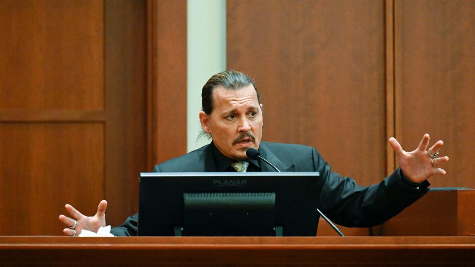 Johnny Depp testifies during a hearing at the Fairfax County Circuit Court in Fairfax, Va., Tuesday April 19, 2022.