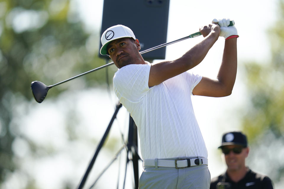 Tony Finau tees off on the ninth hole during the ProAm at the BMW Championship golf tournament at Wilmington Country Club, Wednesday, Aug. 17, 2022, in Wilmington, Del. The BMW Championship tournament begins on Thursday. (AP Photo/Julio Cortez)