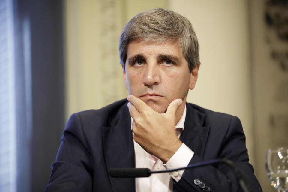 FILE - Then Finance Minister Luis Caputo attends a news conference at the Casa Rosada presidential palace, in Buenos Aires, Argentina, Dec. 30, 2016. Argentina's President-elect Javier Milei announced Wednesday, Nov. 29, 2023, that he has chosen Caputo as his economy minister. (AP Photo/Victor R. Caivano, File)