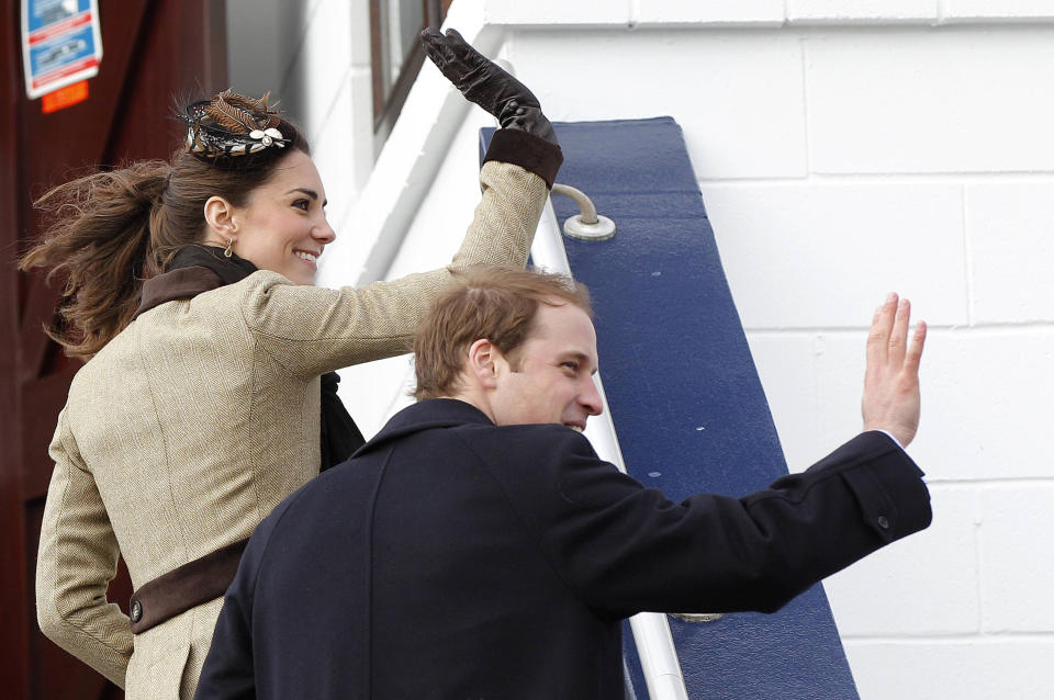 The couple wave to well-wishers after attending a naming ceremony for a new royal lifeboat in February 2011. It was their first official appearance after the announcement of their engagement.