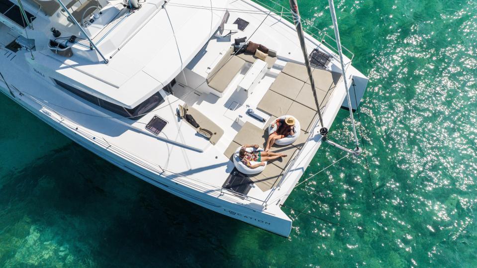 Nik Dorward and Lily Davison aboard the Sailing Location yacht.